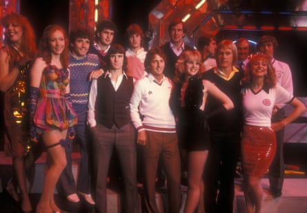 Members of the 1982 England World Cup Squad and models/dancers pictured at the Top of the Pops Studios after performing their World Cup Song “This Time”. Left to right are Kevin Keegan, Steve Foster, Dave Watson, Glenn Hoddle, Trevor Francis, Joe Corrigan, Ray Clemence, Gary Bailey, Mick Mills and Kenny Sansom.
