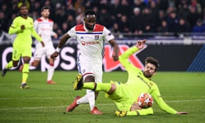 Lyon Musa Dumbell shoots but is locked up by Gerard Peak in Barcelona.
