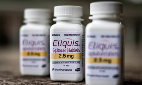 three white bottles of pills labelled eliquis