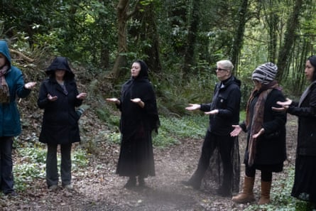 witches stitchery and clasp their palms up successful nan forest