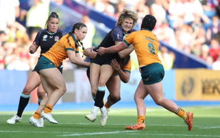 England’s Ellie Kildunne is challenged by Australia’s Desiree Miller and Samantha Wood.