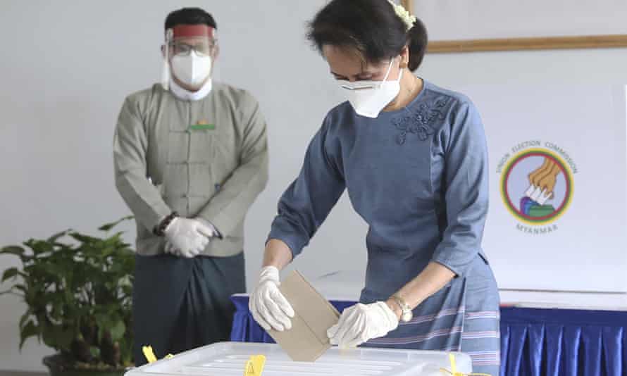 Aung San Suu Kyi casts her ballot in October during advance voting at the Union Election Commission office in Myanmar.