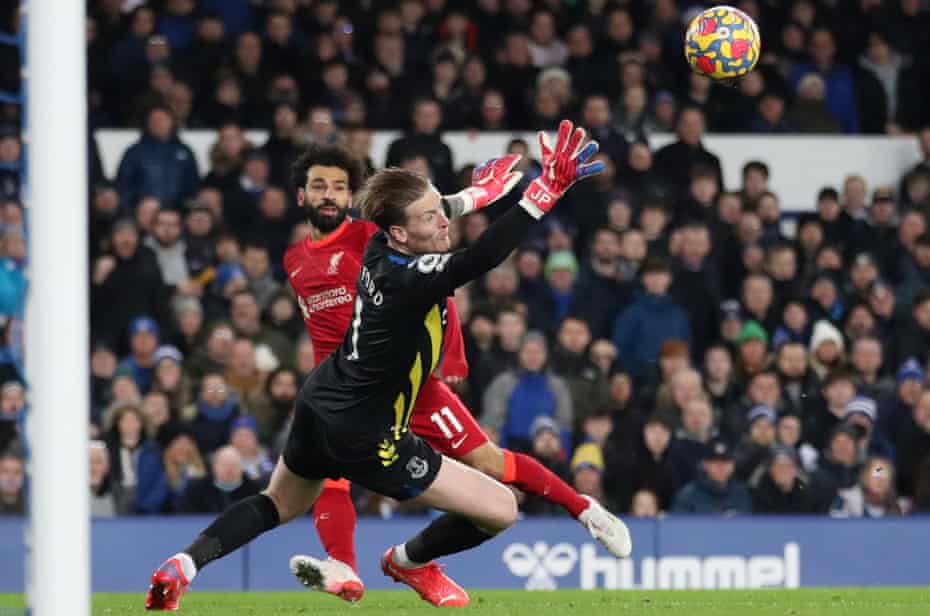 Liverpool's Mohamed Salah scores his first goal against Everton