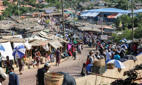 Rohingya refugees gather at a market as first cases of Covid-19 coronavirus have emerge in the area, in Kutupalong refugee camp in Ukhia on 15 May 2020.