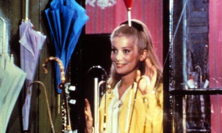 Catherine Deneuve in The Umbrellas of Cherbourg, with music by Legrand.