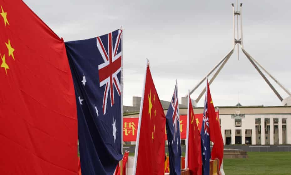 Chinese and Australian flags outside Parliament House