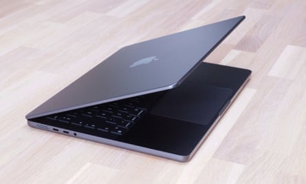 The MacBook Pro M4 in black with its lid open at 45 degrees.