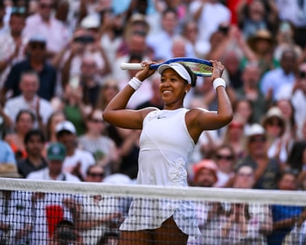 Naomi Osaka of Japan celebrates winning match point against Aryna Sabalenka