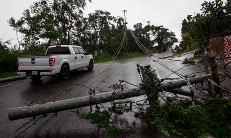 Downed power lines on road PR-743 in Cayey, Puerto Rico during Hurricane Fiona in September.