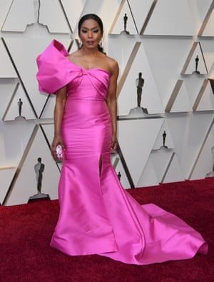 Blank Panther's Angela Bassett opted for a one-shouldered gown by Reem Acra. With a low ponytail and a gigantic bow detail, the actor was tapping into a number of trends – not least this year's red carpet penchant for thinking pink.