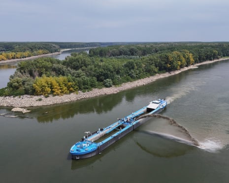 A drone view shows Romanian authorities using a dredging ship to alter the flow of water on Danube's Old branch, near Izvoarele, Romania.