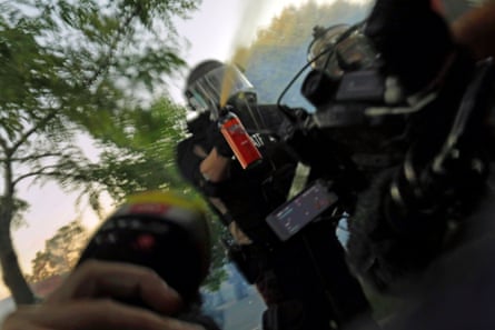 Minnesota State Patrol officers spray journalists with pepper spray at a Black Lives Matter protest in Minneapolis, 5 June