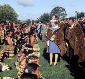 1970: Queen Elizabeth II is seen in a cloak of kiwi feathers as she visits the Māori community in Gisborne, New Zealand