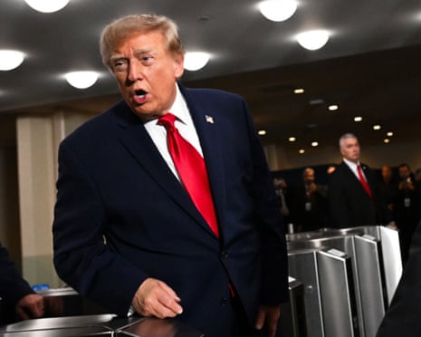 a man in a suit speaks