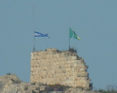 An Israeli flag is raised on Beaufort castle, as seen from Marjayoun, southern Lebanon, on Sunday