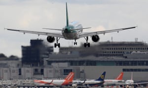 A passenger plane lands in Gatwick.