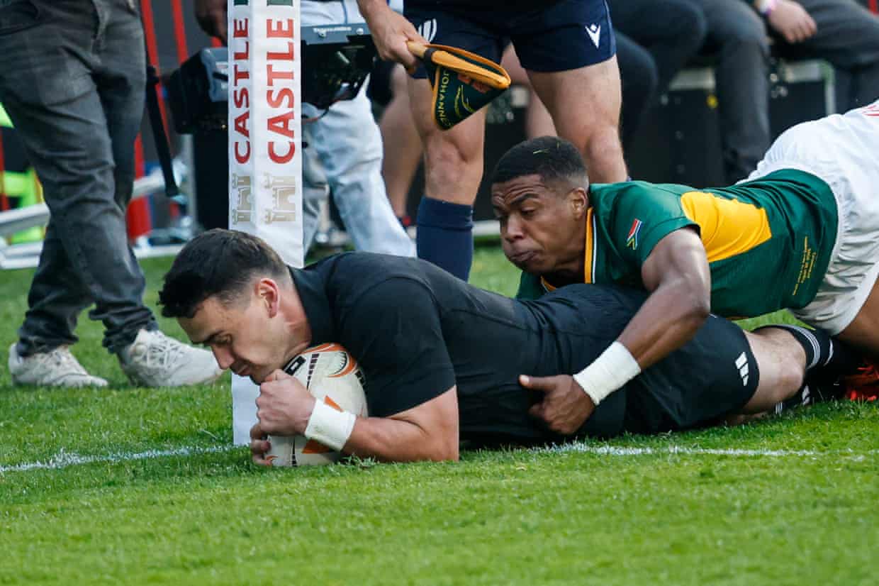 Will Jordan scores a try for New Zealand.