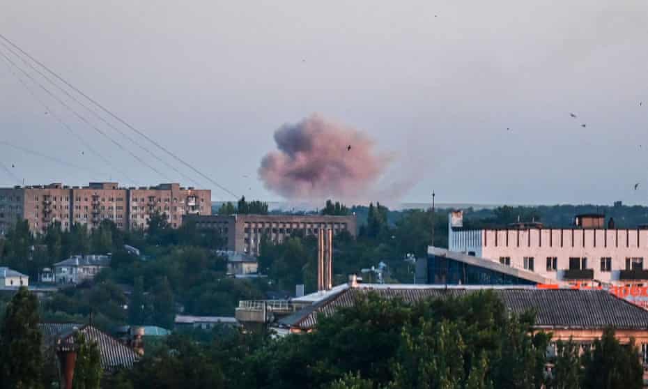 Smoke rises after shelling in Donetsk on Monday amid the ongoing war in Ukraine. 