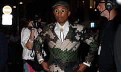 Pharrell Williams in pixilated camouflage at the Louis Vuitton menswear show on the Pont Neuf in Paris.