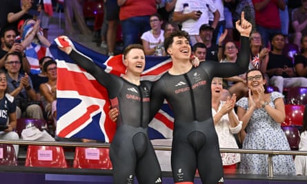 James Ball (left) and Steffan Lloyd soak up the acclaim after winning the men's B1,000m time trial final in Paris.