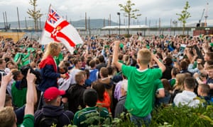 Football fans at the Titanic fan zone in Belfast watch Northern Ireland v Germany.