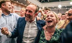 Sigrid Friis and Martin Lidegaard of The Social Liberal Party react during an election party during the European Union elections at Green Power Denmark in Copenhagen 