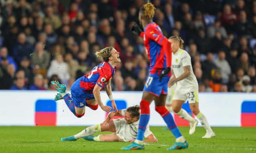 Crunch: A sliding tackle from Leeds United's Luke Ayling that sent Crystal Palace's Conor Gallagher flying.