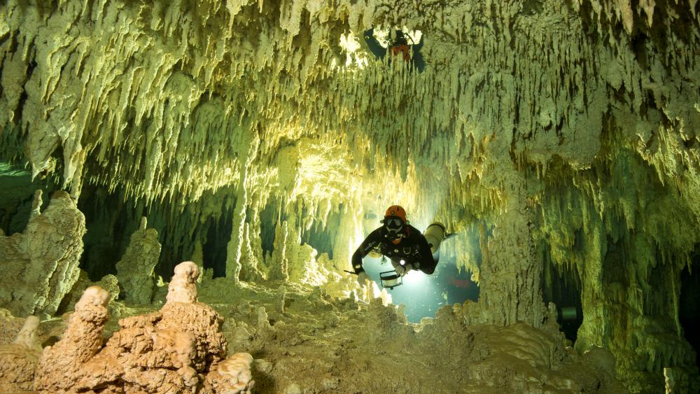 Divers discover world's longest flooded cave – video