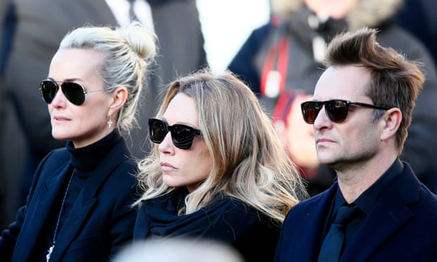 Johnny Hallyday’s wife Laeticia, left, his daughter Laura Smet and son David Hallyday, right, attending the rocker’s funeral last December