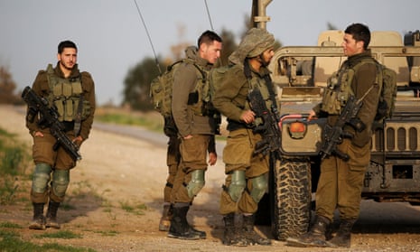 Israeli soldiers near the border fence with the southern Gaza Strip.