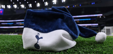 a Father Christmas hat on the pitch at Spurs.