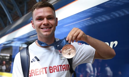 Team GB’s Lewis Richardson shows off the bronze medal he won in the men’s 71kg boxing