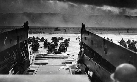 US Army troops wading ashore at Omaha Beach in north-western France, during the D-Day invasion, 6 June 1944.