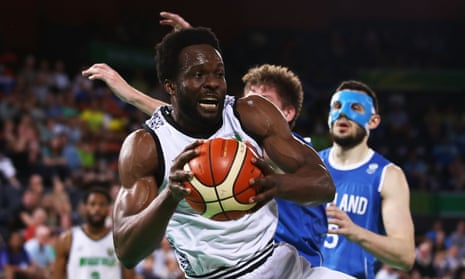 God’sgift Achiuwa of Nigeria rebounds during Nigeria’s match with Scotland.