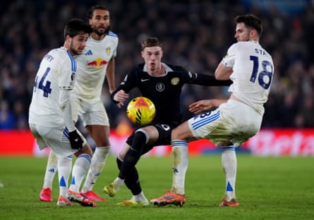 Chelsea’s Cole Palmer battles for the ball with Leeds United’s Ilia Gruev and Anton Stach.