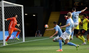 Manchester City’s Aymeric Laporte heads in the fourth.