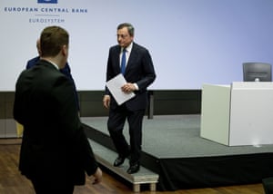 President of European Central Bank Mario Draghi leaves the podium after chairing his final governing council meeting