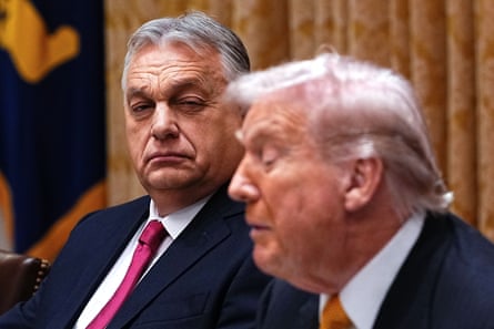 Viktor Orban looks at Donald Trump whoâÂÂs seated next to him