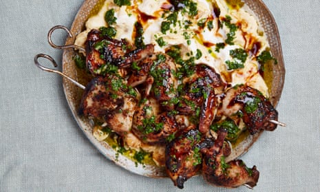 Yotam Ottolenghi’s hummus with grilled quail, pomegranate molasses and parsley salsa.