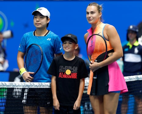 The players pose for a photo before plays starts.