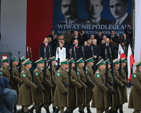 Polish President Karol Nawrocki (L-back) and first lady Marta Nawrocka (2L-back) attend the Independence Day celebrations in front of the tomb of the Unknown Warrior at Pilsudski Square in Warsaw, Poland.