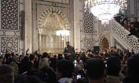 Abu Mohammed al-Jolani, addresses a crowd at the capital’s landmark Umayyad Mosque