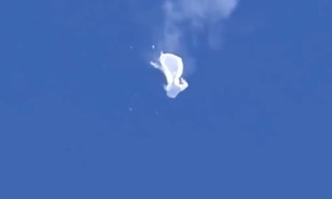 Chinese spy balloon drifts to the ocean after being shot down off the coast in Surfside Beach, South Carolina, on 4 February.