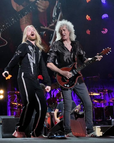 Sam Ryder with Brian May of Queen.