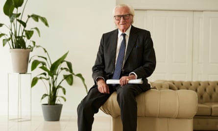 Lord Heseltine posing for a recent portrait in a suit and tie.