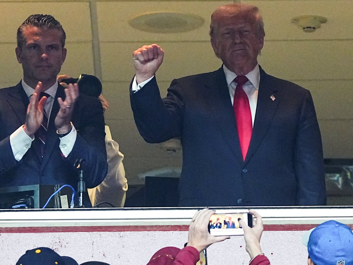 Trump booed at Commanders NFL game before calling plays from Fox broadcast booth | NFL | The Guardian
