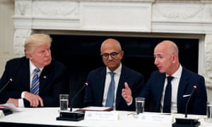 Donald Trump, Microsoft’s Satya Nadella and Bezos at a roundtable event in the White House last year.