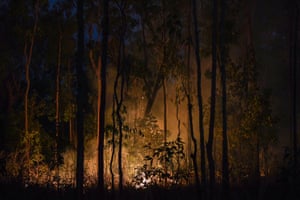 A small wildfire burns at Bouchat near Weipa in far North Queensland