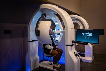 Luca Bassetti sits in a machine