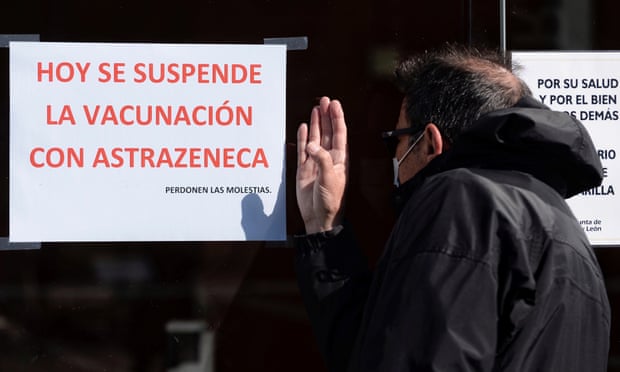A man tries to see into a closed vaccination centre in Valladolid, central Spain, on 7 April after Castile and León’s regional government suspended the use of the AstraZeneca jab ahead of the EMA’s report on its safety.